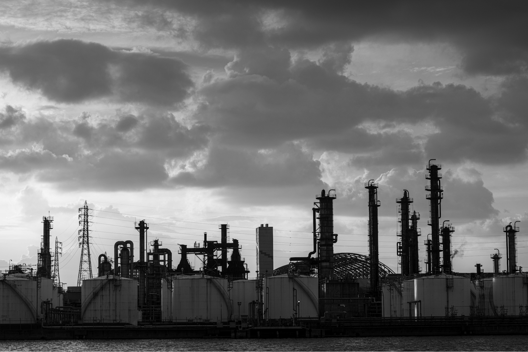 Refinery atmospheric tower overhead system affected by amine salt deposits from triazine treated crude